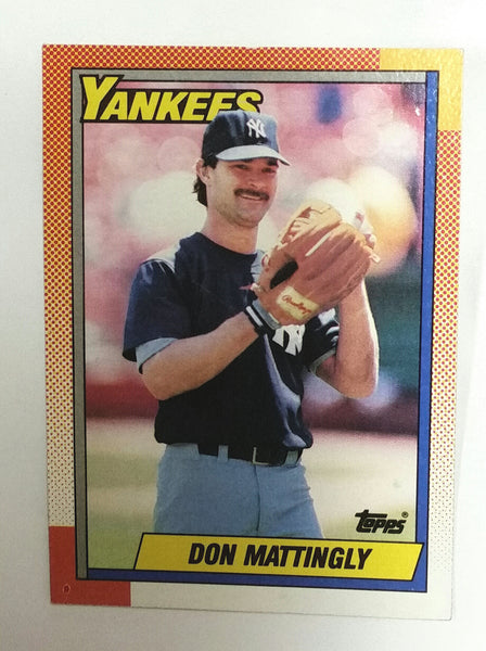 New York Yankees first baseman Don Mattingly watches as his 200th